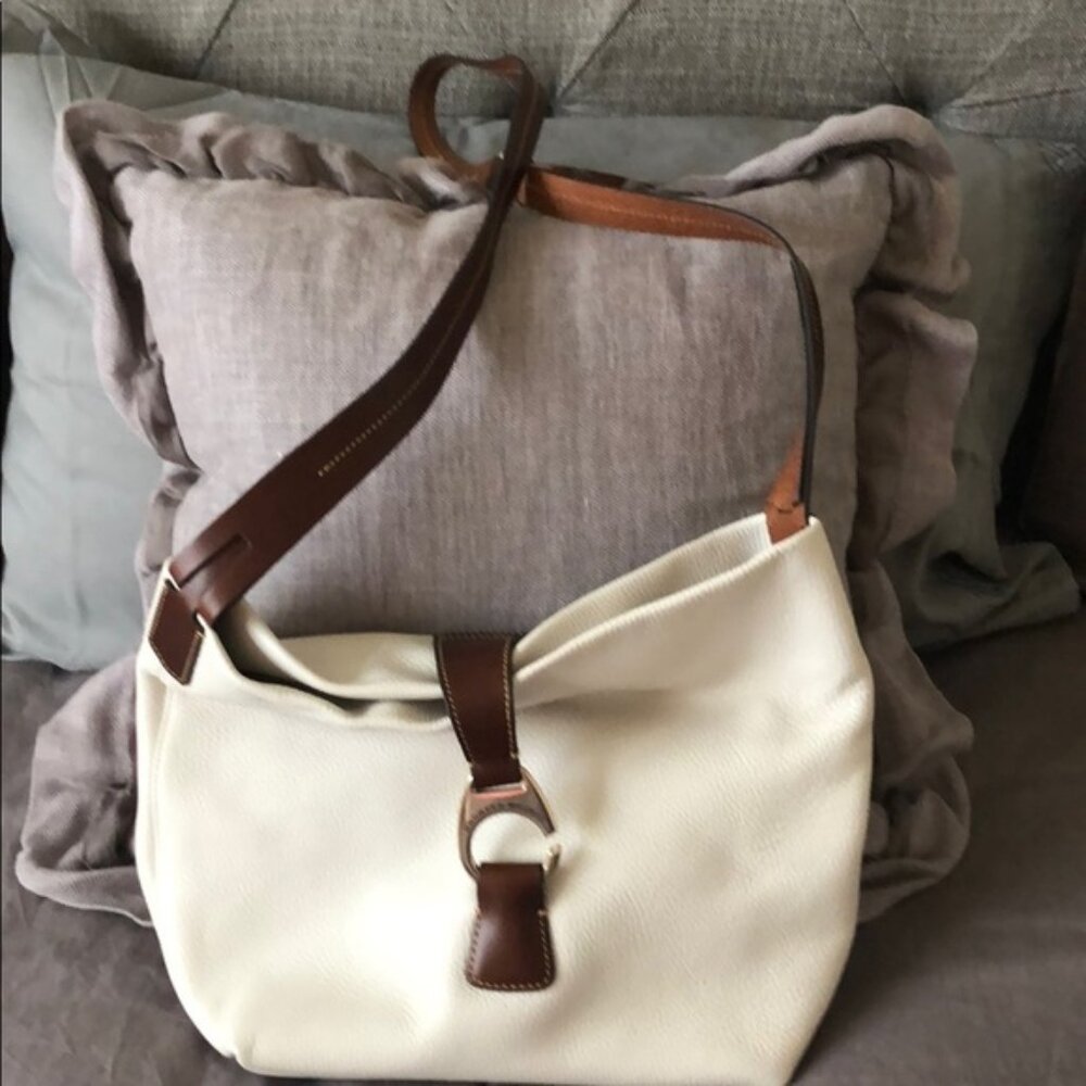 Dooney & Bourke Cream & Brown Leather CrossbodyBag With Gold “C” Ring/Clasp